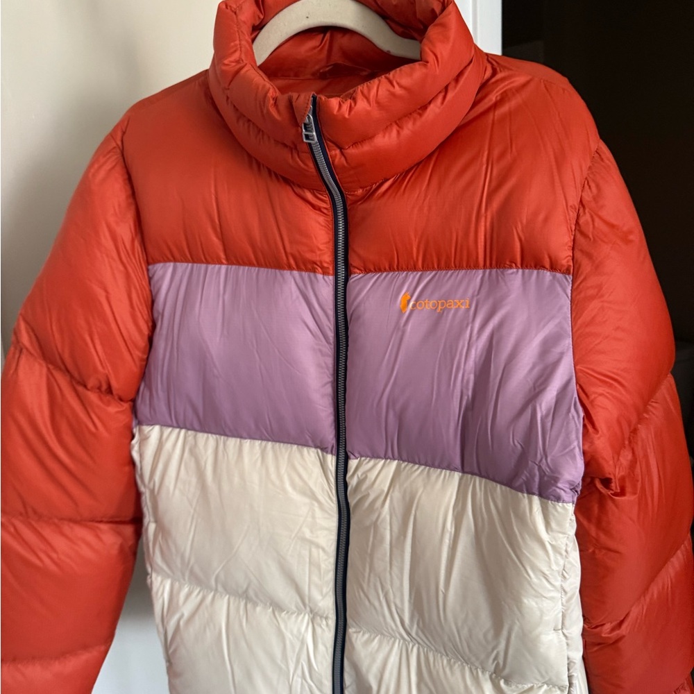 Cotopaxi Red, Purple, and Cream Puffer Jacket